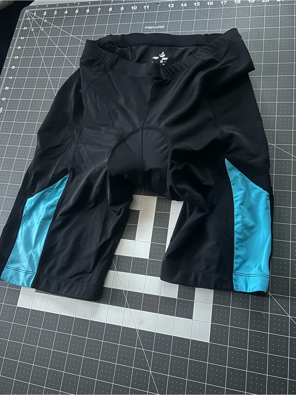 Men's Black Athletic Cycling Shorts with Teal Accent Panels